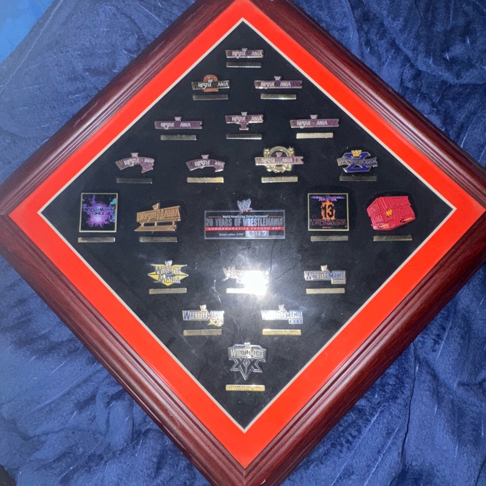 WWE Wrestlemania 20th anniversary Pin Collection in Framed Display.